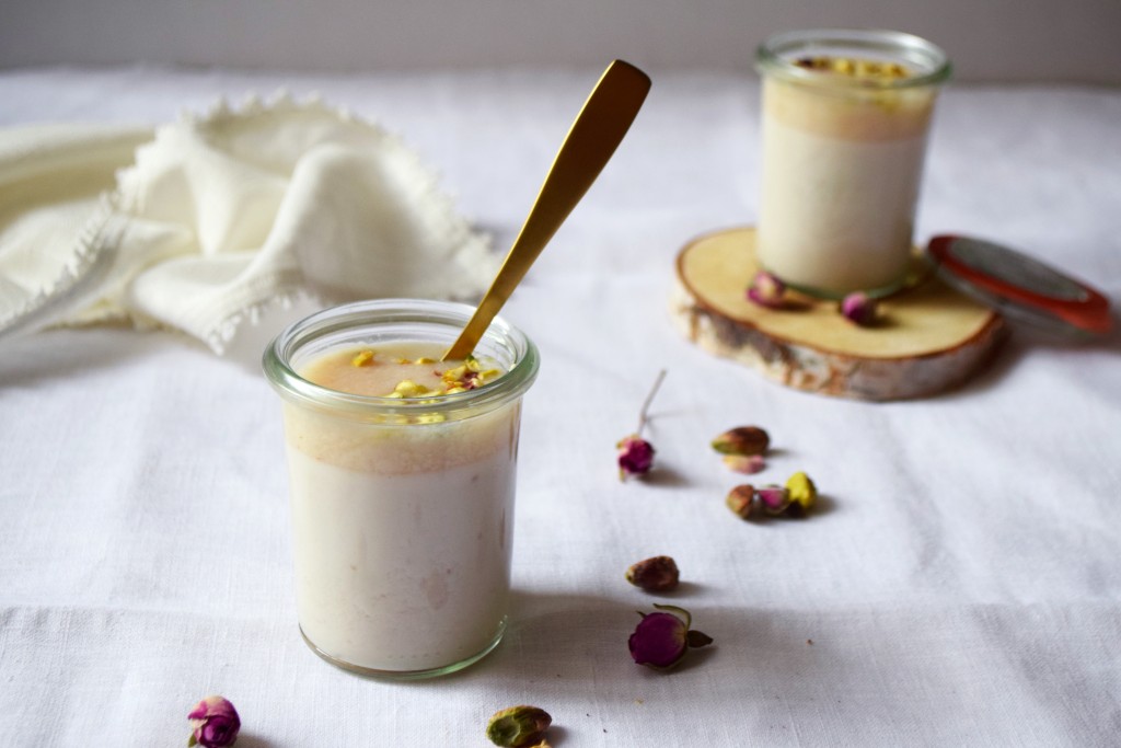 Rose panacotta pot with litchi purée and shredded pistachios front view