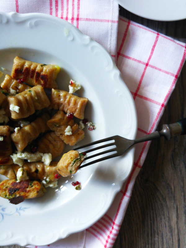 Spelt and wild garlic gnocchis with marinated cheese