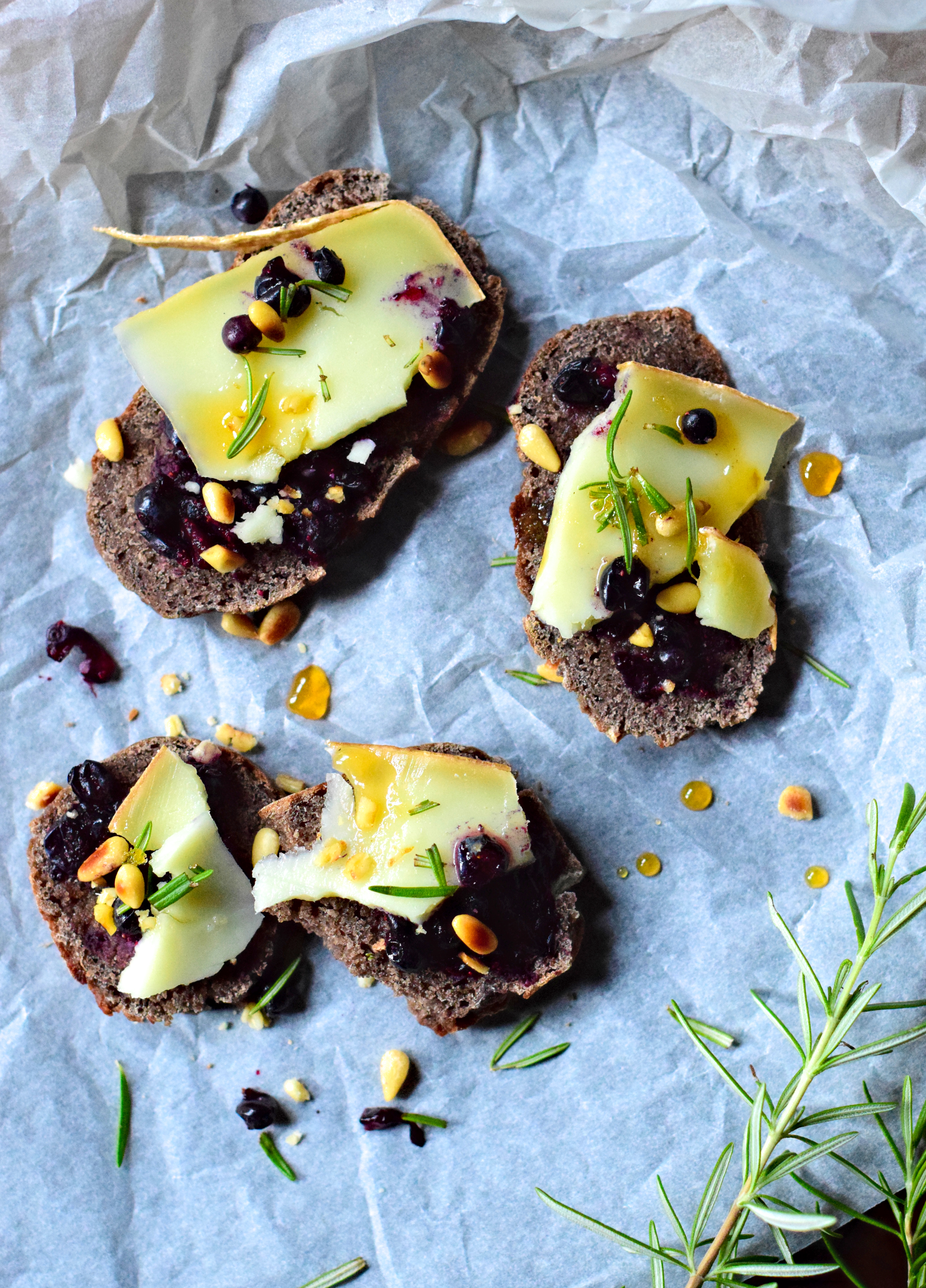 Buckwheat toasts with rosemary, sheep cheese & wild blueberries